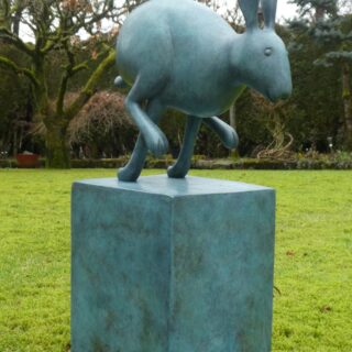bronze sculpture of a hare running