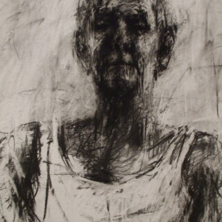 portrait of a man in a white vest
