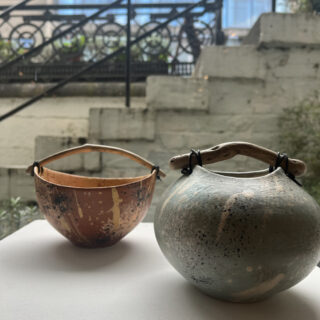 two ceramic pots in situ