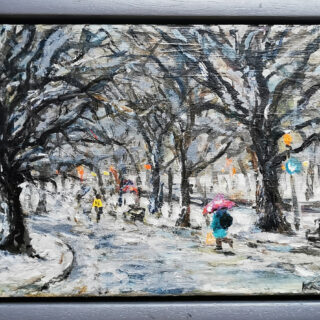 snowy winter scene with figure running along street