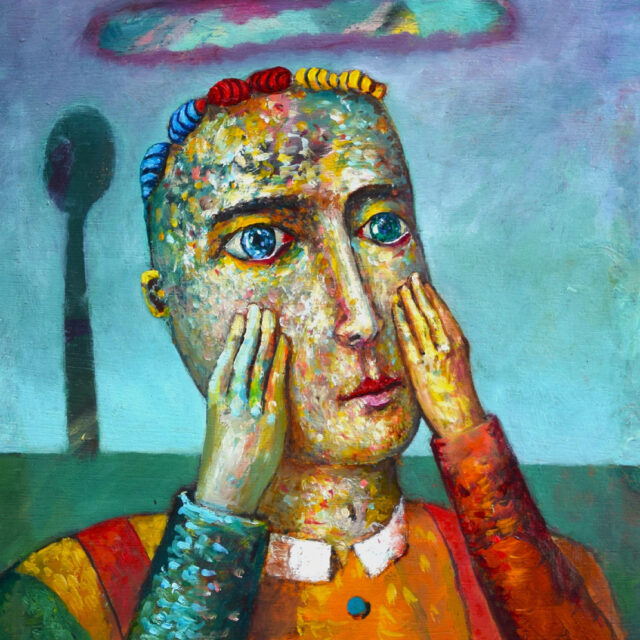 man with hands to face