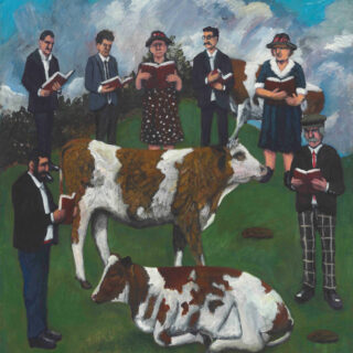 people singing to cows